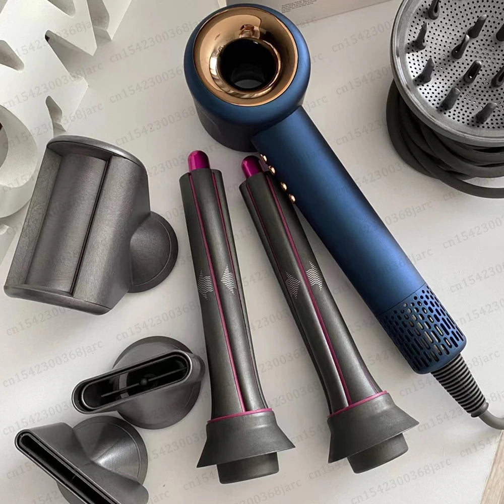 Blue and gold leafless ionic hair dryer with styling attachments, diffuser, and curling barrels for professional use.