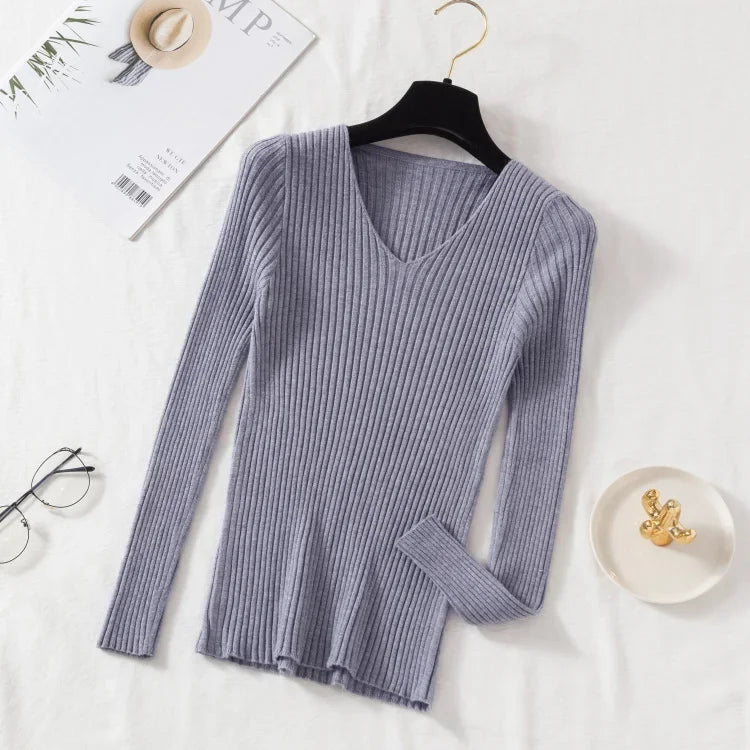 Tidesmit grey ribbed knitted long-sleeve sweater featuring a slim fit, v-neckline, and soft vertical knit texture.