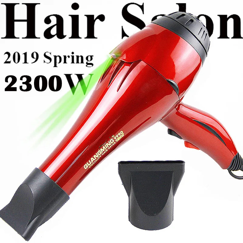 Professional 2300W red salon hair dryer with styling nozzle attachment, ergonomic design, and long cord.