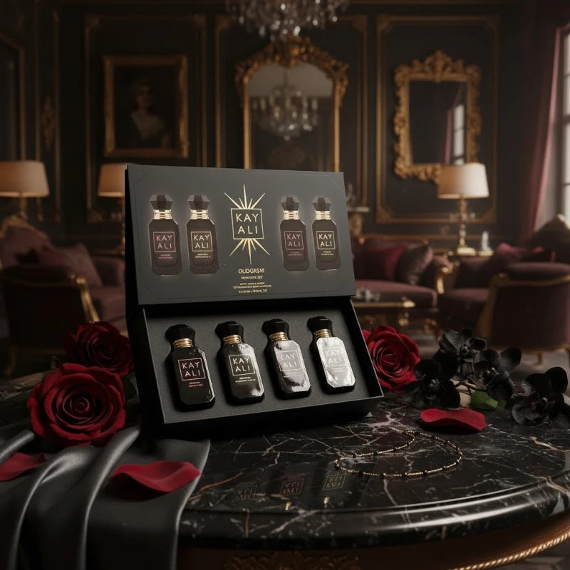 KAYALI Oudgasm gift set: 4x10ml luxury floral musk perfumes in sleek black bottles. Long-lasting women’s fragrance set.