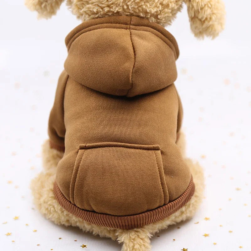 Small dog in a cozy brown hooded sweater, perfect for thick, warm autumn and winter fashion.