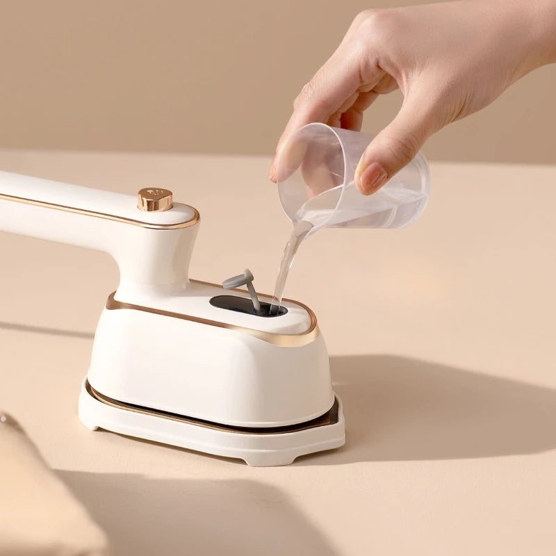 Tidesmit portable handheld steam iron for wet and dry garment care with compact design for efficient home use