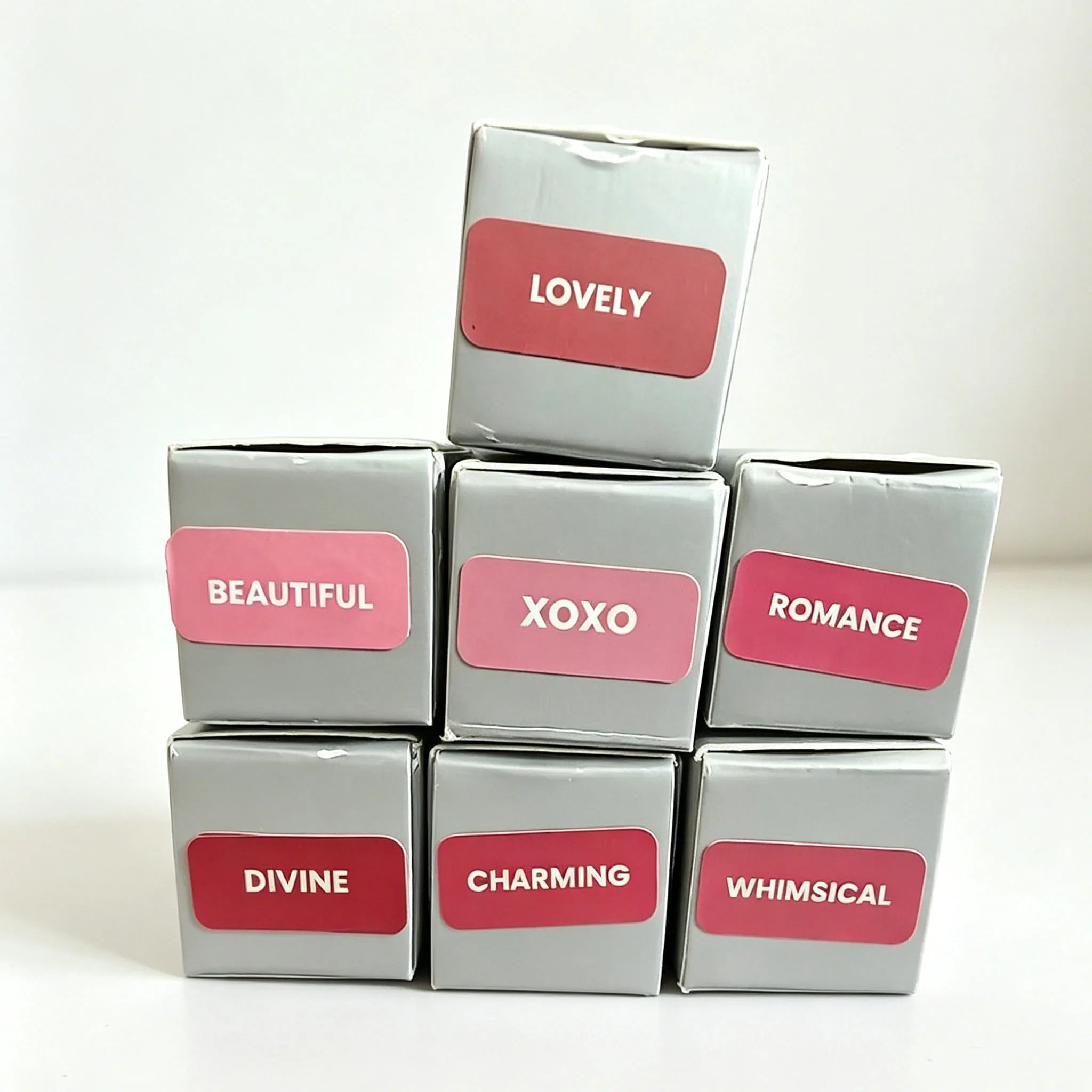 Wonderskin peel-off lip stain boxes in assorted pink and red shades, waterproof long-lasting lip makeup collection.