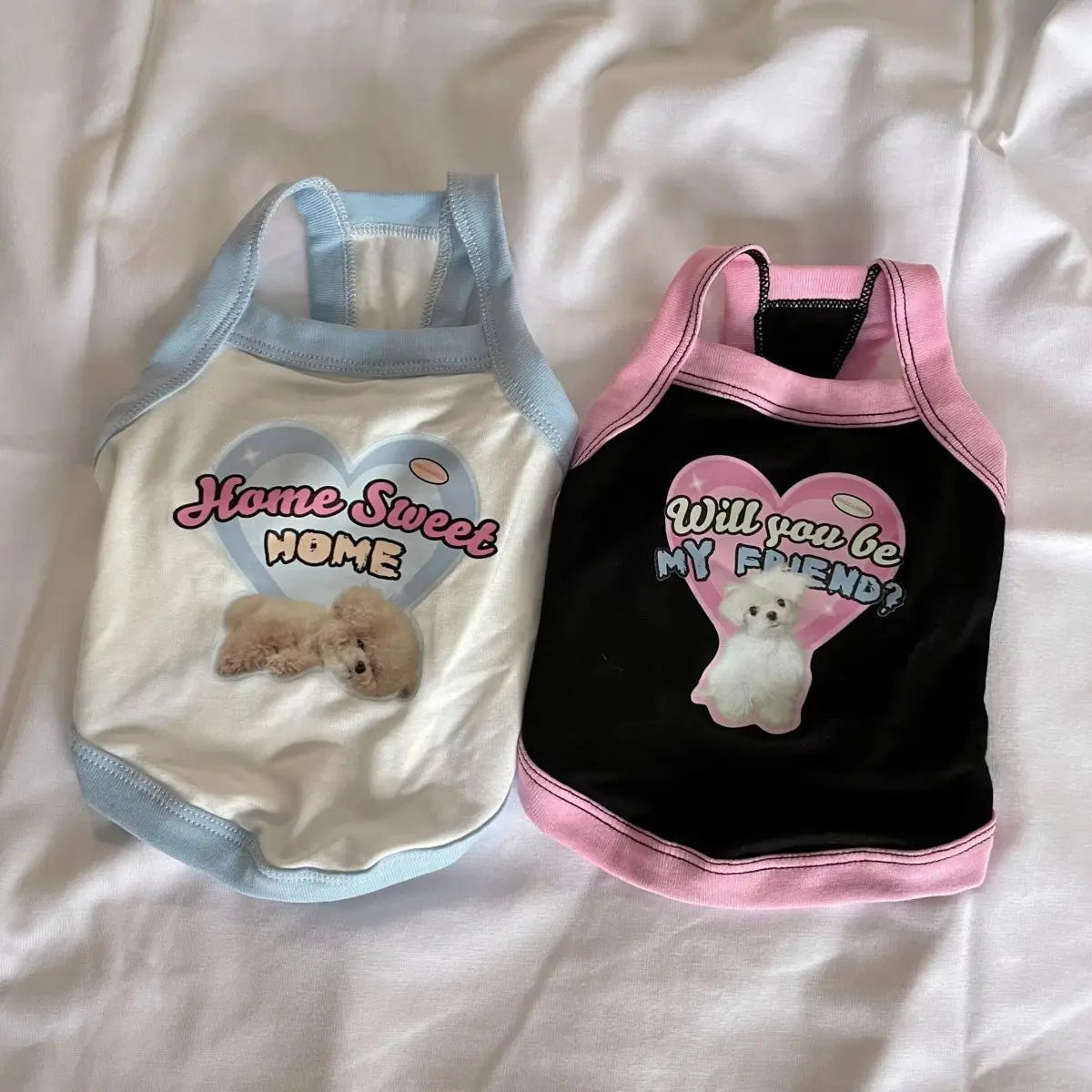 Cute spring camisole vests for small dogs, featuring contrasting colors and fun graphic prints for stylish puppies.