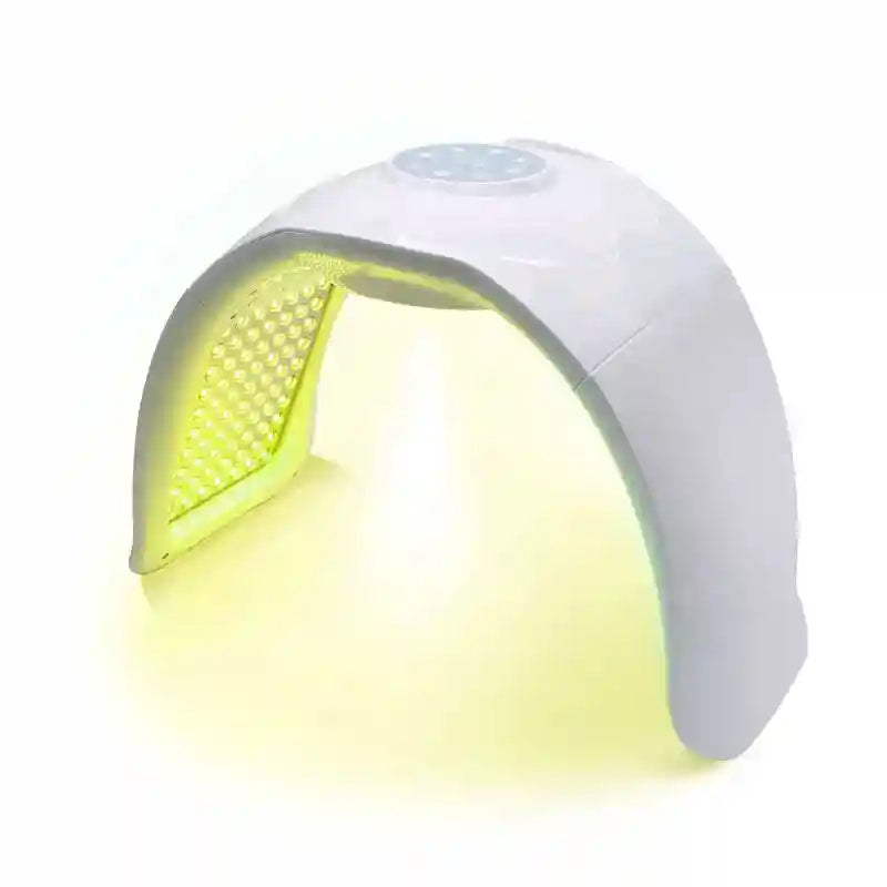 White arched LED light therapy mask for home skincare, featuring yellow light and control panel for facial rejuvenation.