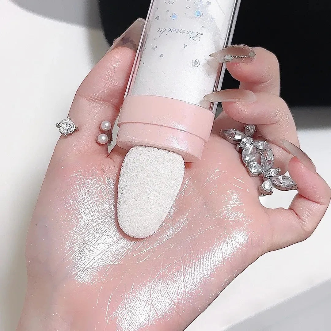 Tidesmit 3-color glitter powder highlighter for face and body showing shimmering texture close-up for makeup contour