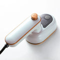 Tidesmit handheld garment steamer and professional iron for dry or wet ironing of clothes at home or while traveling.