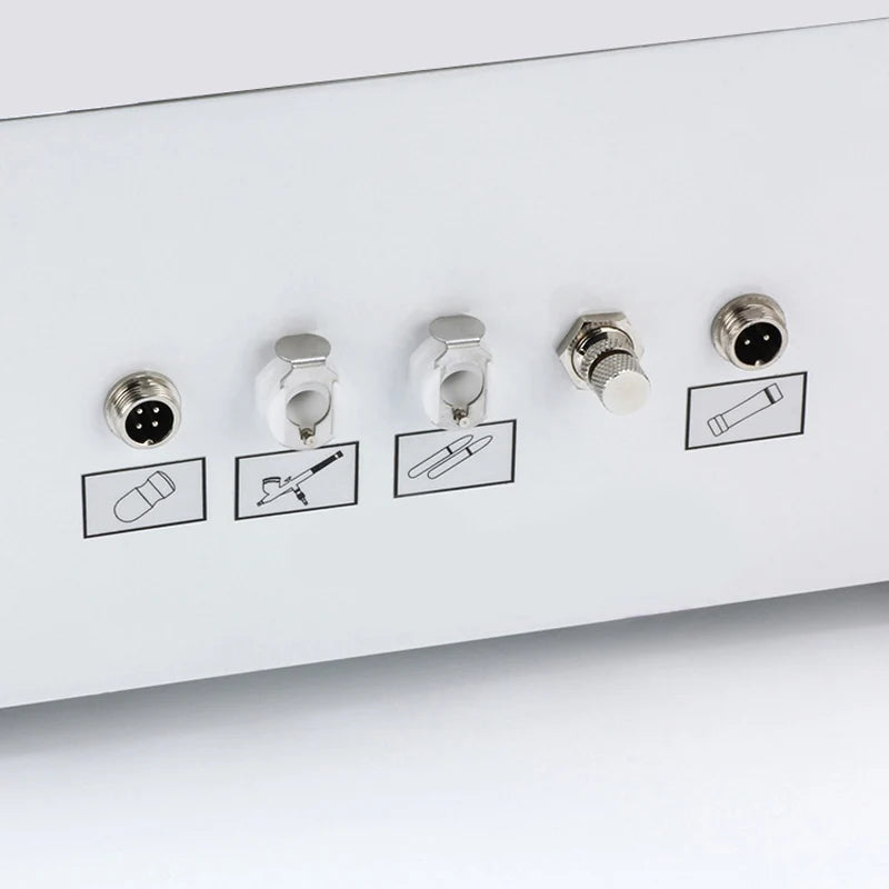 White 7-in-1 hydro facial machine console with ports and icons for microdermabrasion and ultrasonic skin care tools.