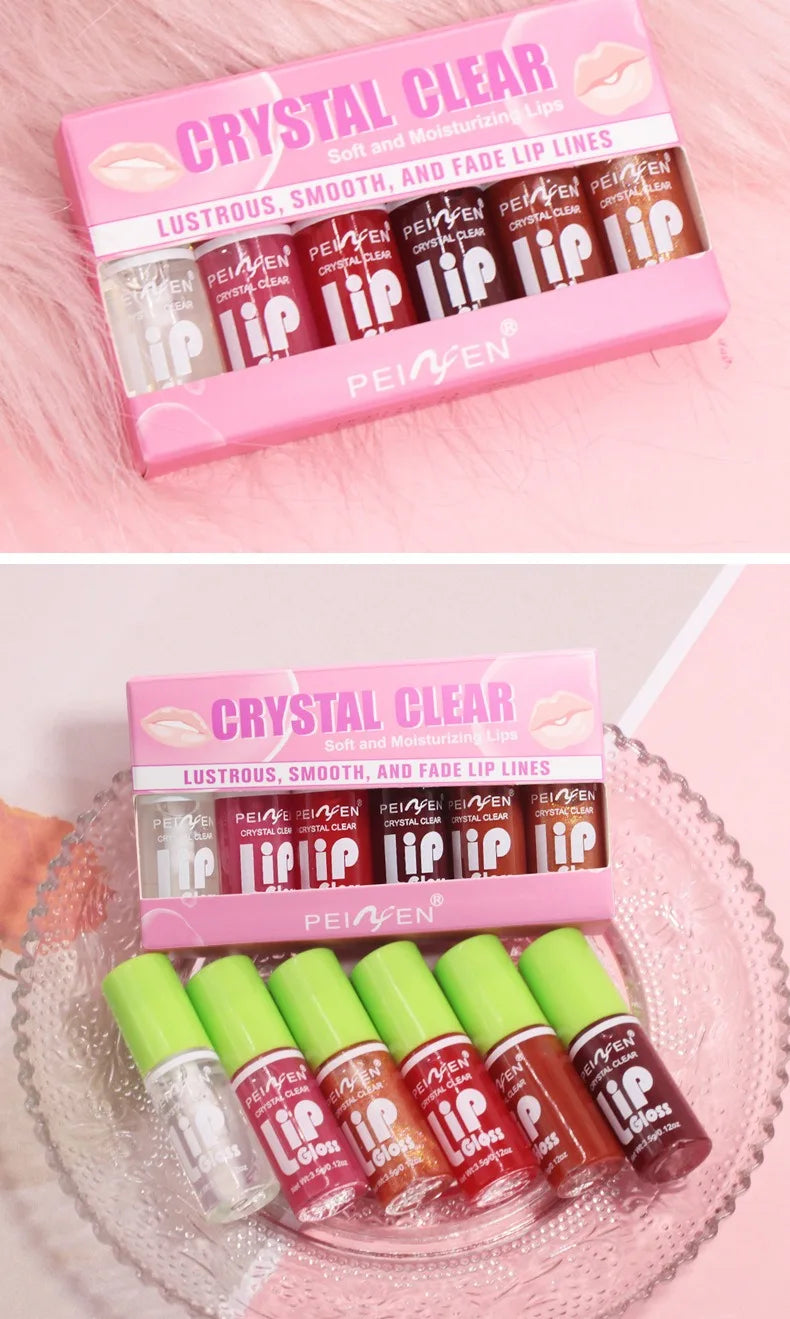 Set of 6 moisturizing crystal clear lip glosses with green caps in a pink gift box for hydrating, plumping lip care.