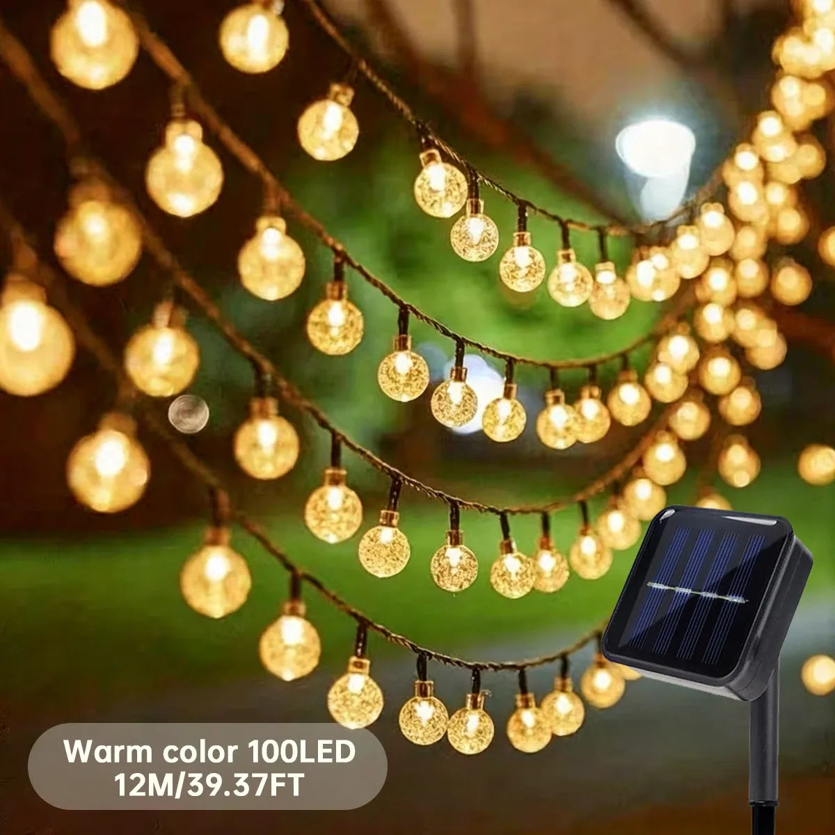 Warm LED globe string lights with hanging bulbs and a small solar panel stake, close-up view.