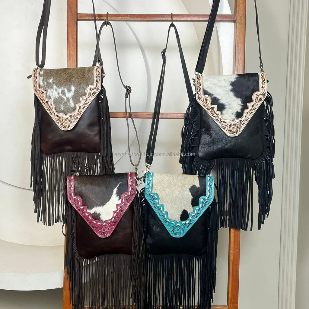 Designer fringe crossbody bags in tooled genuine leather with cowhide flaps in black, brown, turquoise, and pink.
