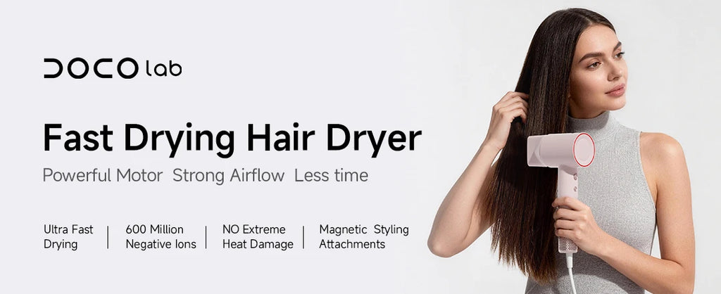 DOCO high-speed ionic hair dryer in light pink with magnetic styling nozzle, designed for fast, damage-free drying.