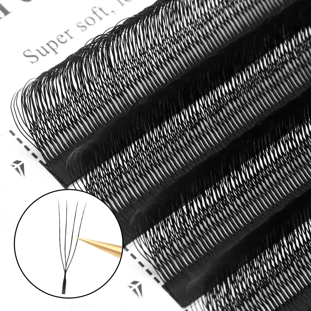 Black pre-made volume eyelash extension fans on a white adhesive strip for professional lash application.