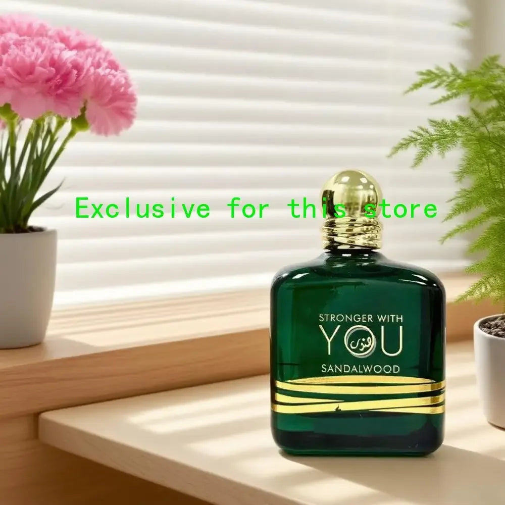 Stronger With You Sandalwood 100ml EDP: Long-lasting unisex perfume in a green square bottle with gold accents.