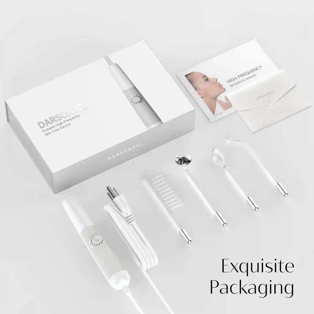 Darsonval high-frequency facial wand kit with white handle, power cord, four glass electrodes, and manual in a box.