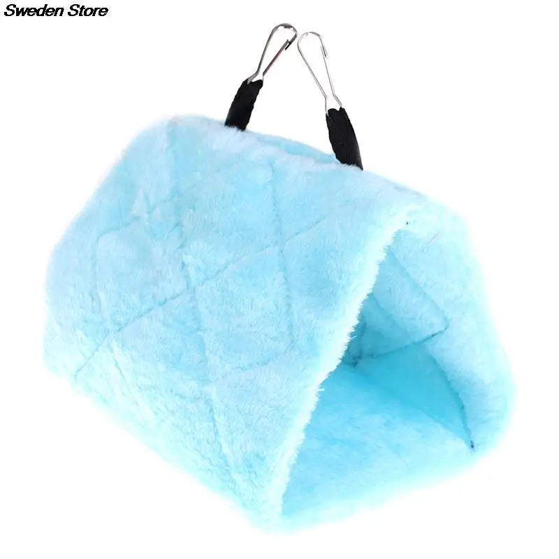 Soft blue plush hanging hammock bed for hamsters, rats, and birds. Warm, cozy cage accessory for small pets.