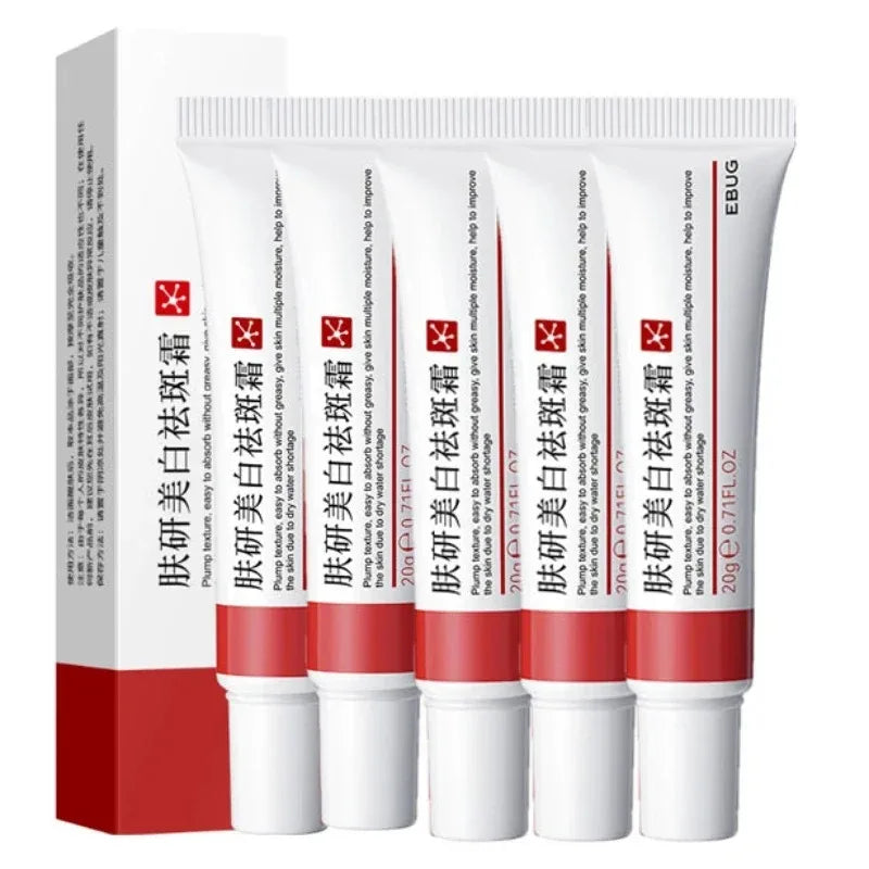 Set of five EBUG whitening freckle cream tubes with white caps and red labels