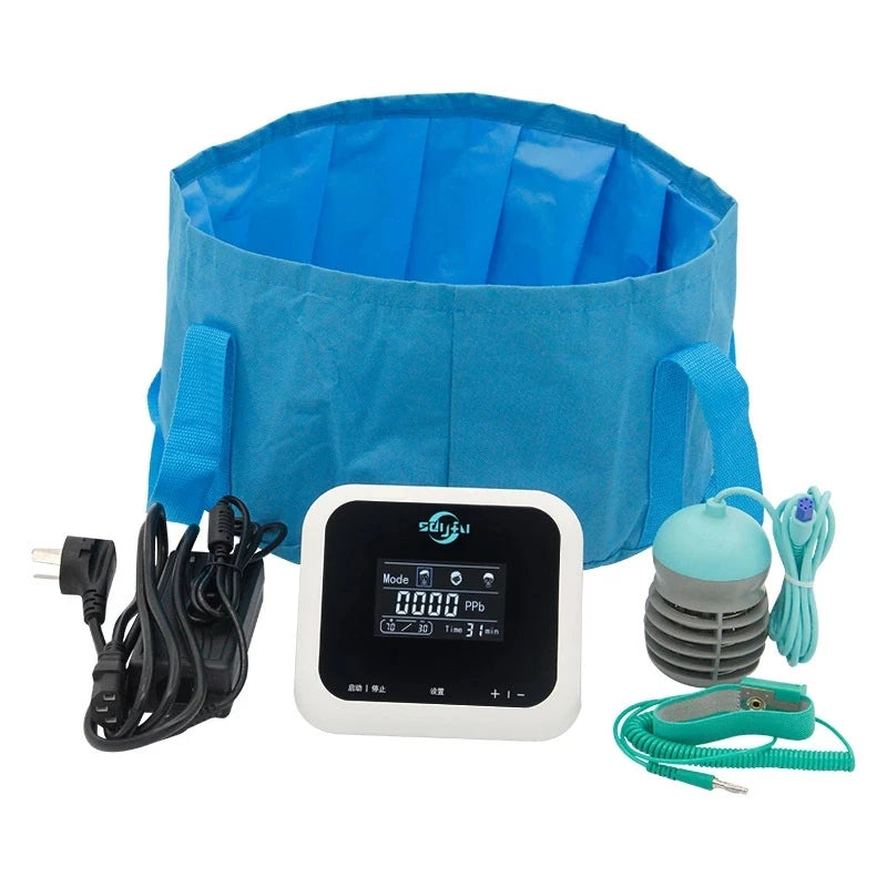 Blue foldable ionic foot spa bath with digital control unit, power cord, array, and wrist strap for detox therapy.