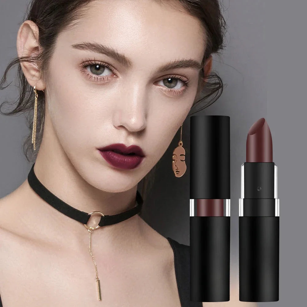 Waterproof matte lipstick in dark wine red on model, featuring a black tube and high-pigment long-lasting lip makeup.