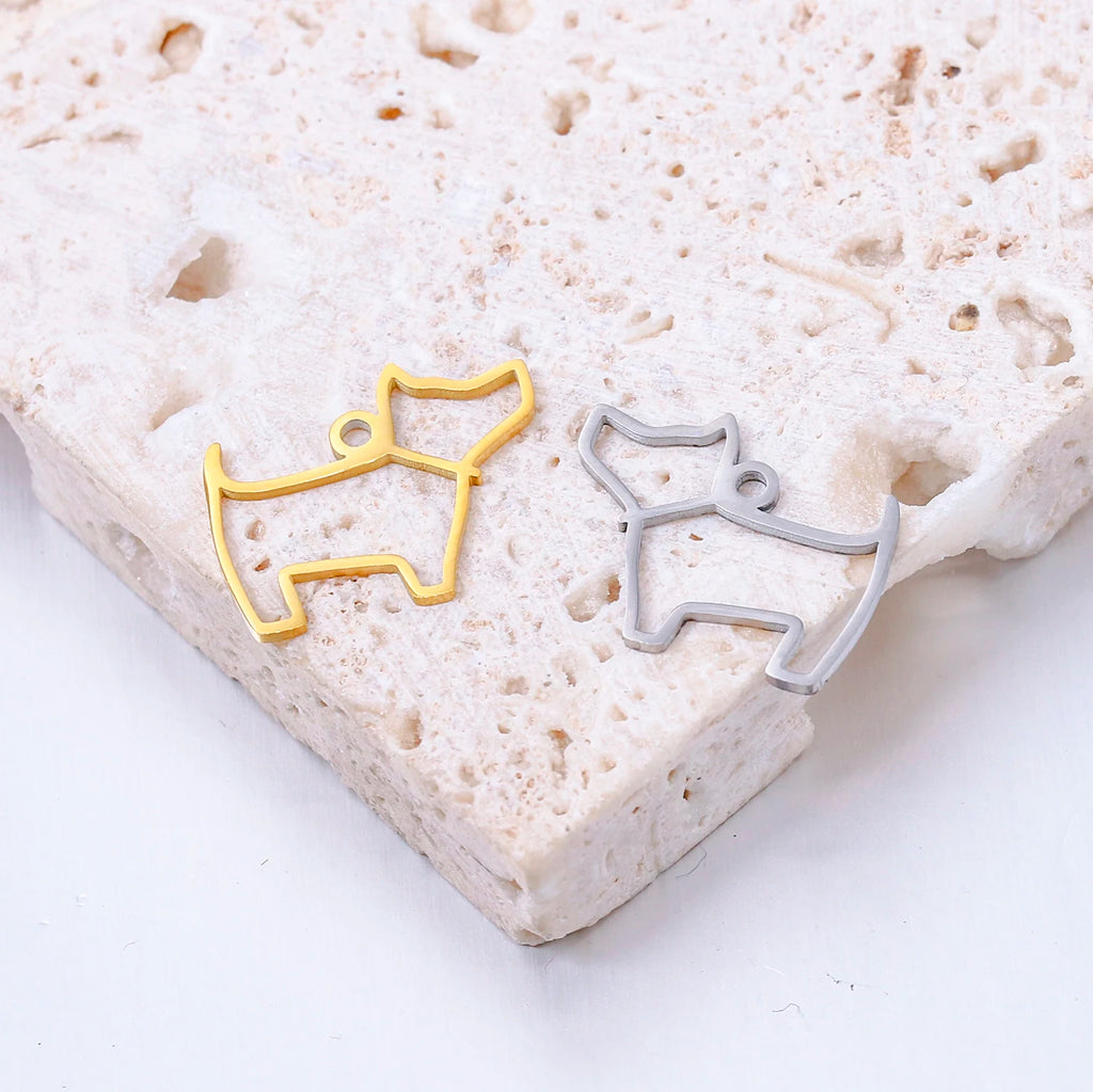Gold and silver stainless steel balloon dog charms for DIY jewelry making, necklaces, and bracelets.