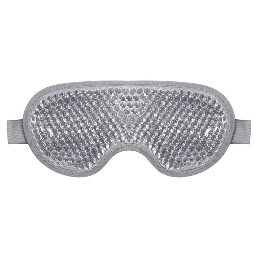 Grey gel bead eye mask with a clear, textured surface and elastic side straps, isolated on a white background.