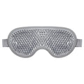 Grey gel bead eye mask with a clear, textured surface and elastic side straps, isolated on a white background.