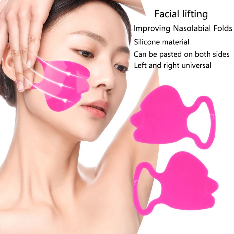A woman applying a bright pink, heart-shaped silicone face patch to her cheek for anti-wrinkle and lifting support.