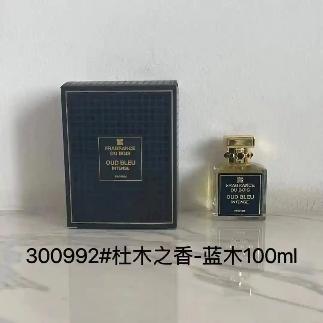 Fragrance Du Bois Oud Bleu Intense unisex parfum: luxury woody aromatic scent in a square glass bottle with gold cap.