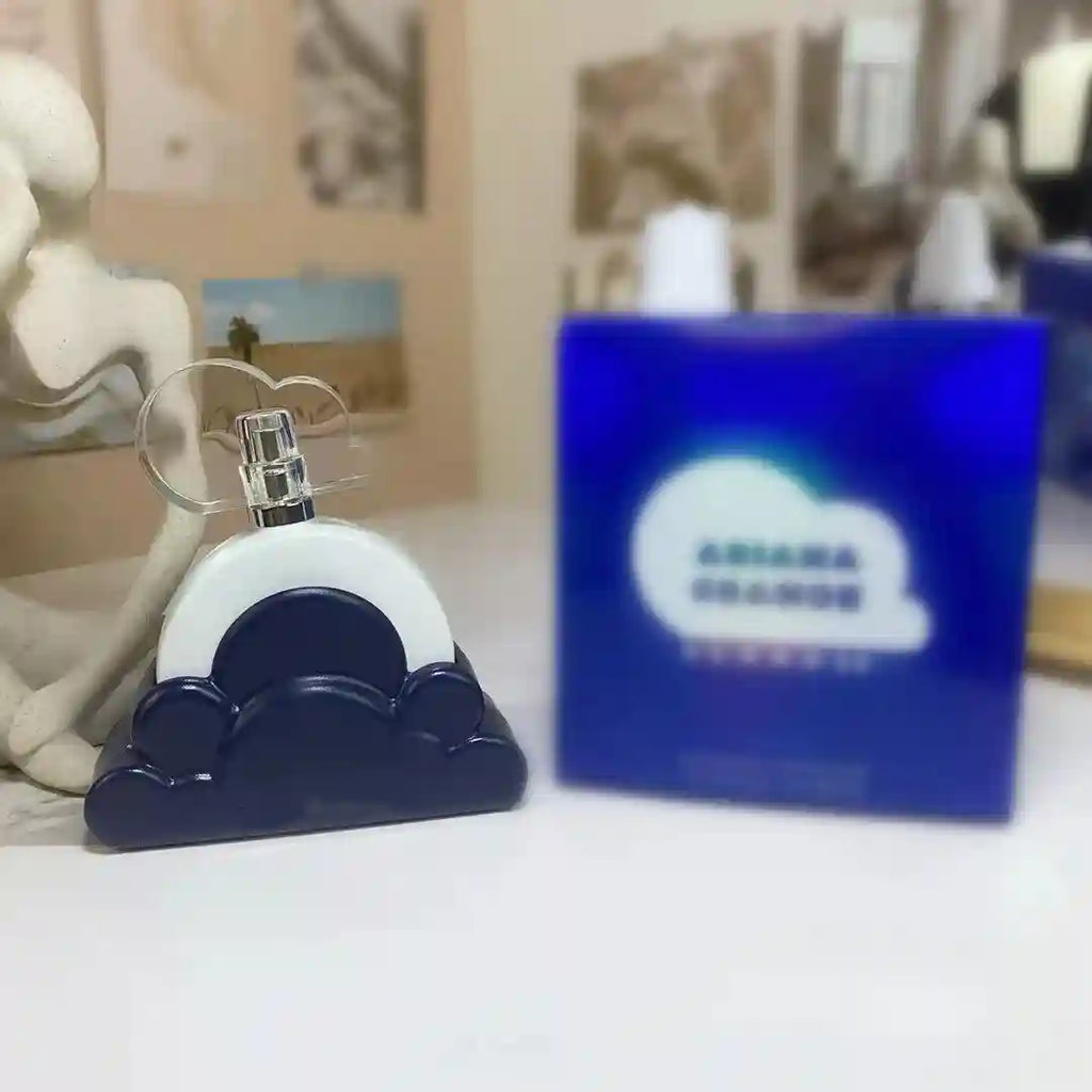 Ariana Grande Cloud Eau de Toilette: 100ml women’s perfume in iconic navy cloud bottle. Long-lasting floral fragrance.
