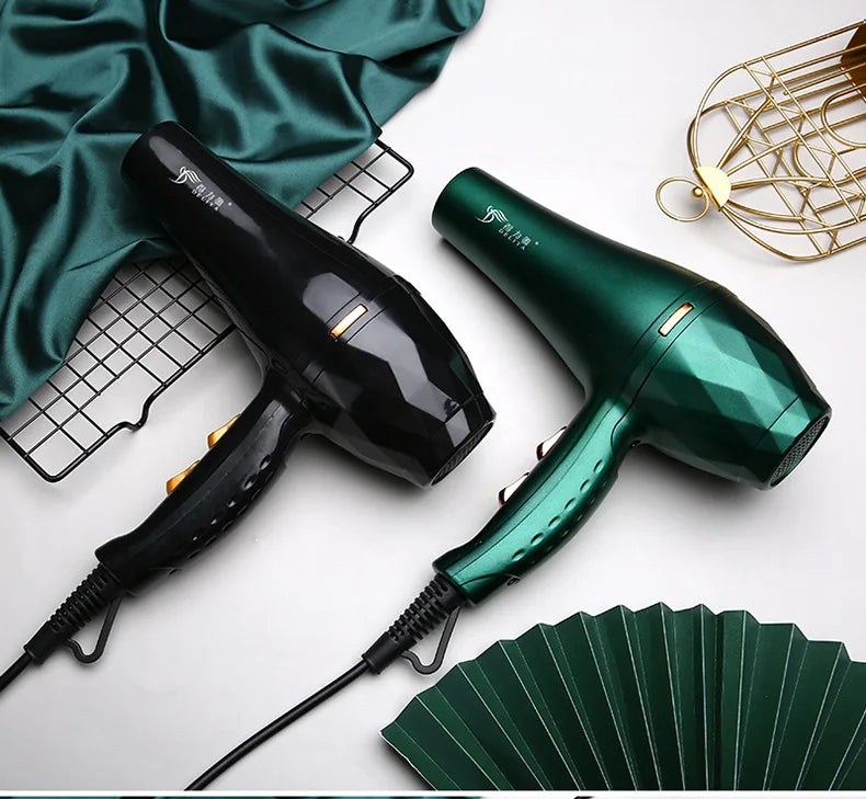 Black and green high-power professional hair dryers with geometric design, cold/hot settings, and ergonomic handles.