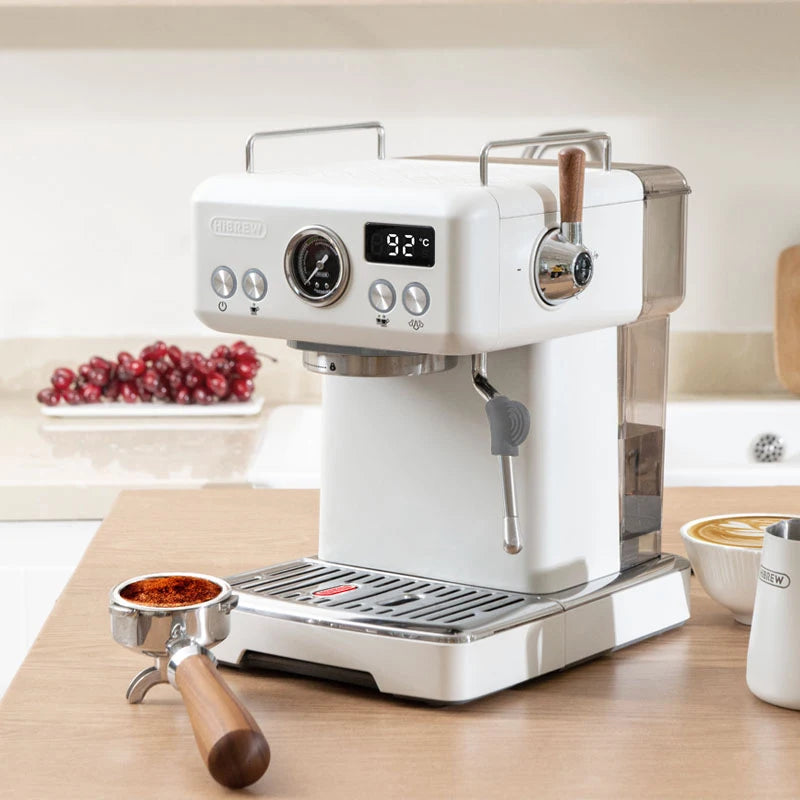 HiBREW white espresso coffee machine with digital temperature display, pressure gauge, and wooden handle portafilter.