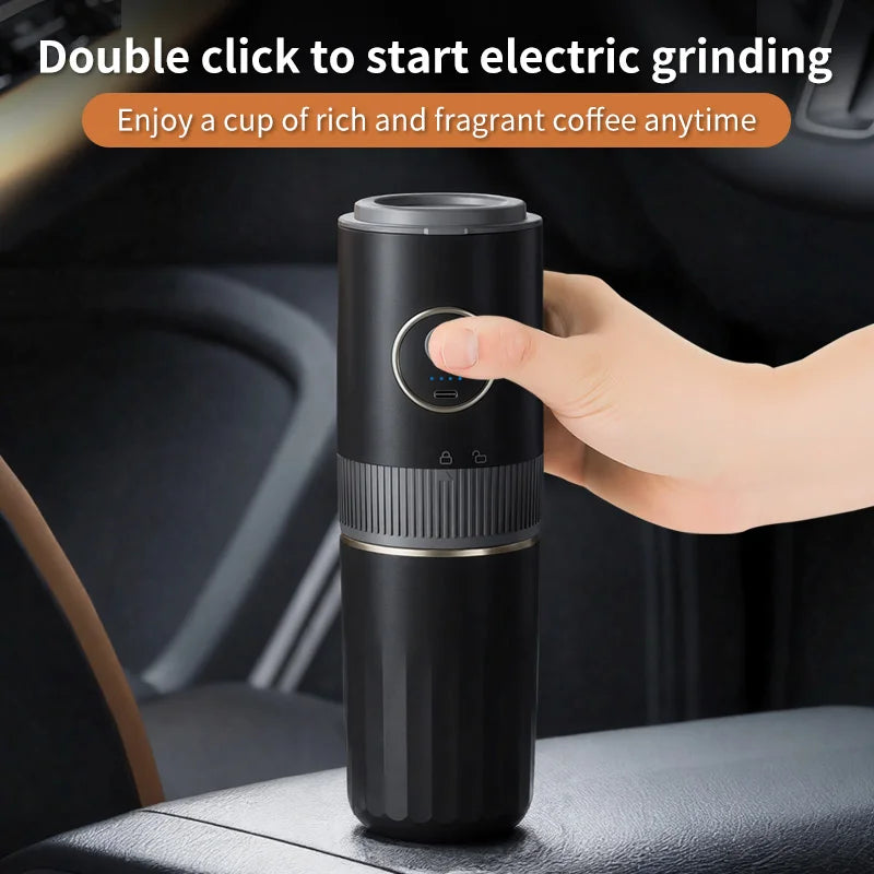 Handheld black electric coffee bean grinder for travel with USB-C port and locking mechanism in a car setting.