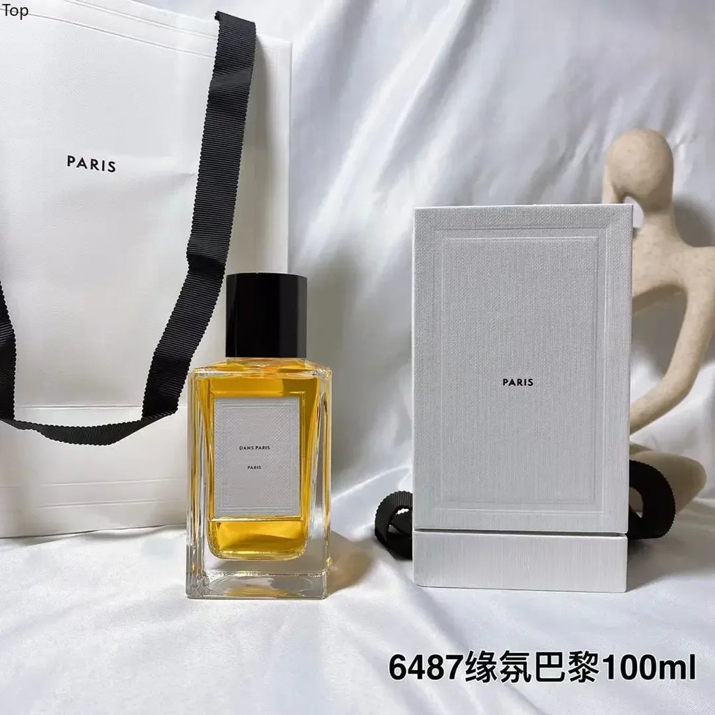 Dans Paris unisex perfume 100ml, luxury rectangular glass bottle with black cap, long-lasting eau de parfum fragrance.
