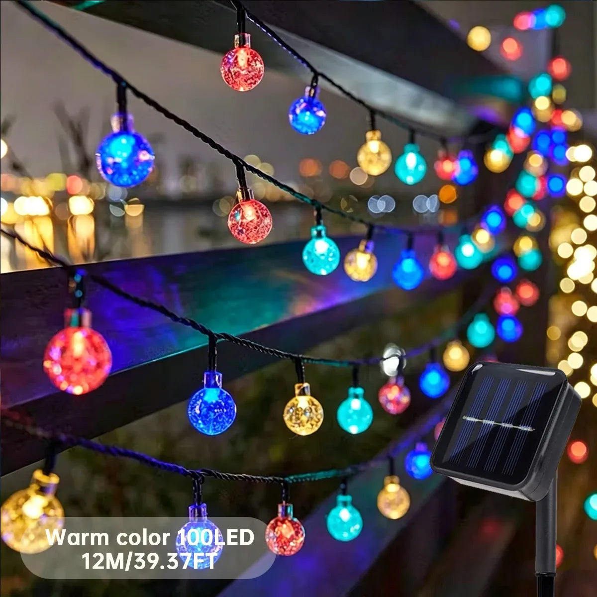 Color-changing LED globe string lights with multicolor bulbs and a solar panel stake outdoors.