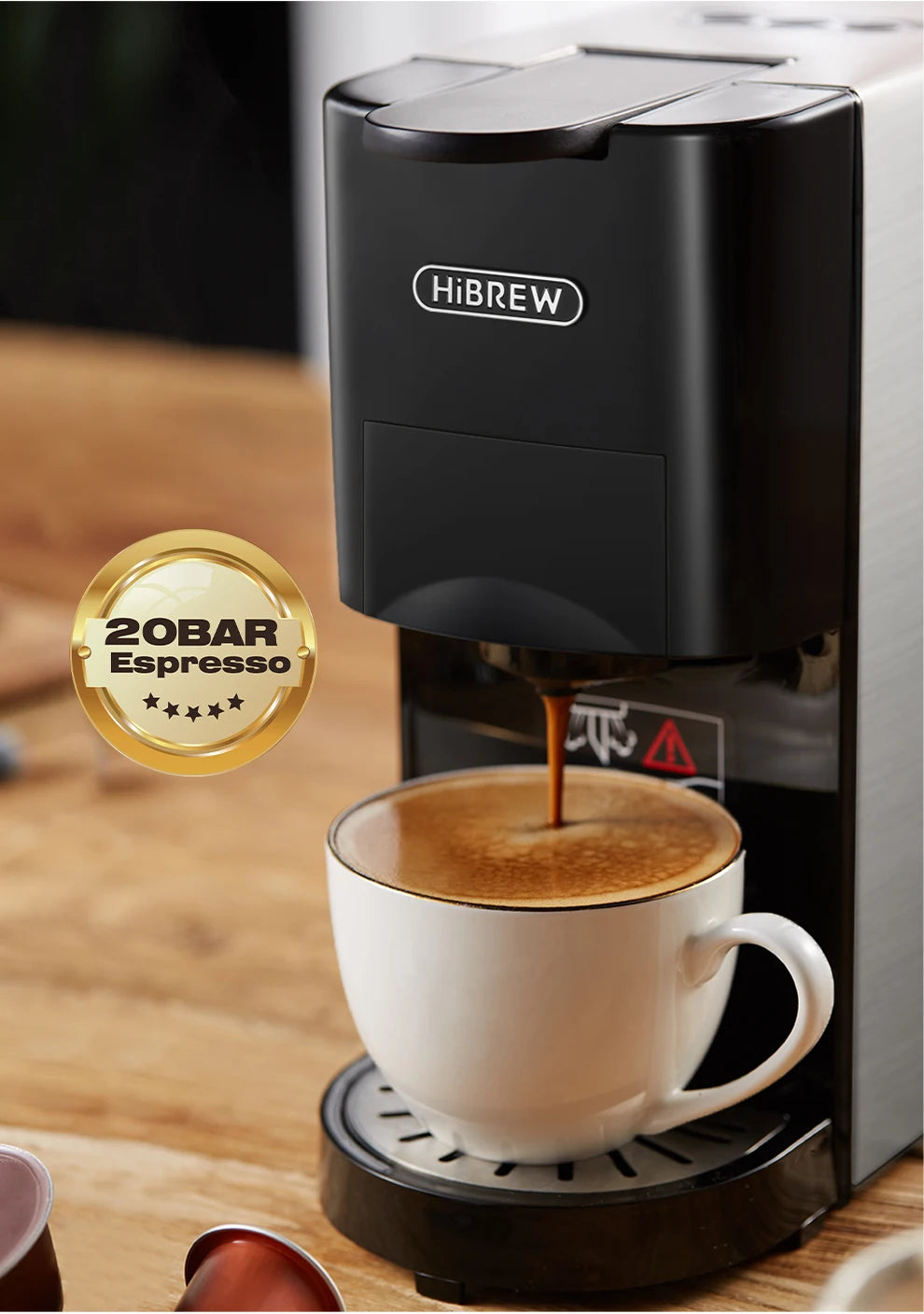 HiBREW 20-bar espresso machine in sleek black and silver brewing fresh coffee into a white ceramic cup.