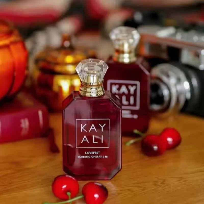 Kayali Lovefest Burning Cherry 48 EDP: A luxury 100ml floral fruity woody sweet fragrance in a red glass bottle.