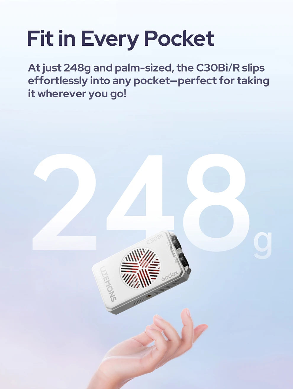Palm-sized, white Litemons C30Bi pocket LED light weighing 248g, floating above a hand.