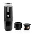 Portable black electric espresso maker with battery indicator, detachable brewing chamber, and reusable mesh filter.