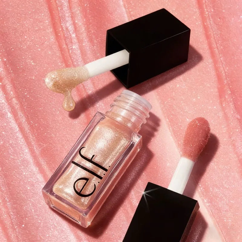 e.l.f. Glow Reviver Lip Oil in shimmering peach. Moisturizing high-shine lip glaze with doe-foot applicator.