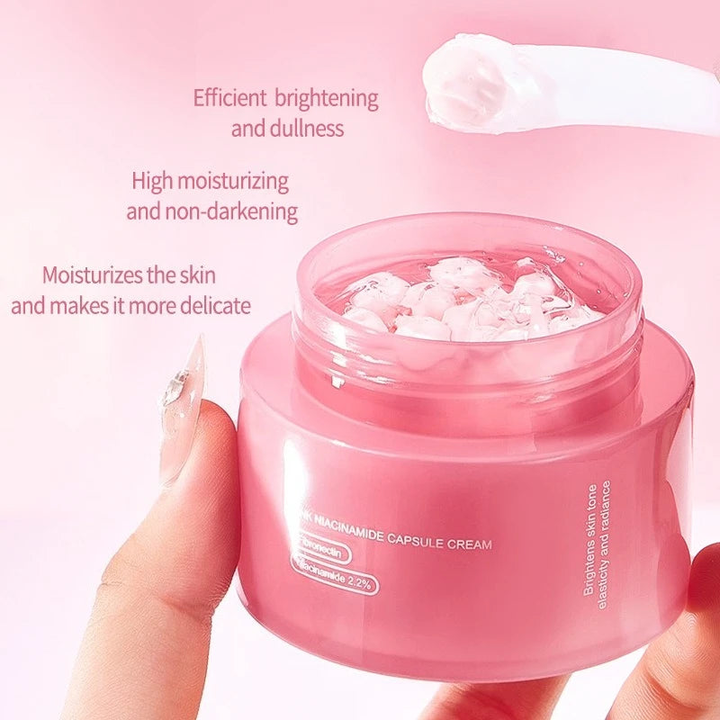 A small pink jar of collagen PDRN capsule cream with a spatula scoop, showing white capsules suspended in clear gel.