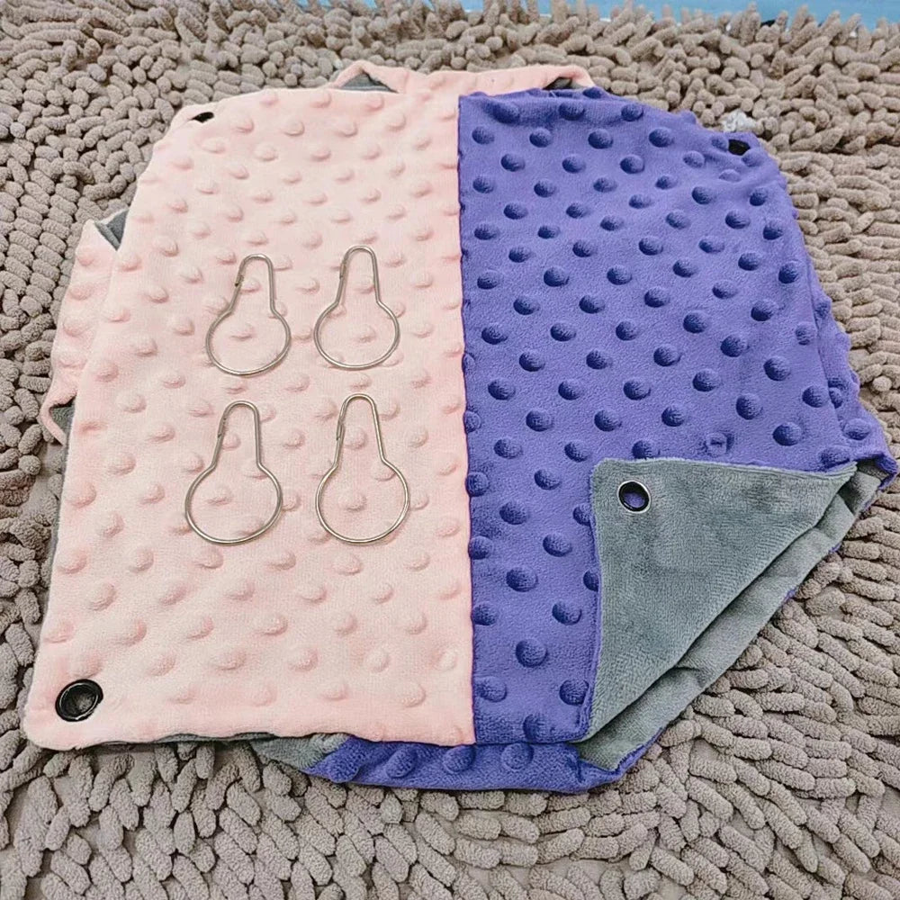 Warm plush hanging hammock for guinea pigs and squirrels, pink and purple contrast design with four metal hooks.