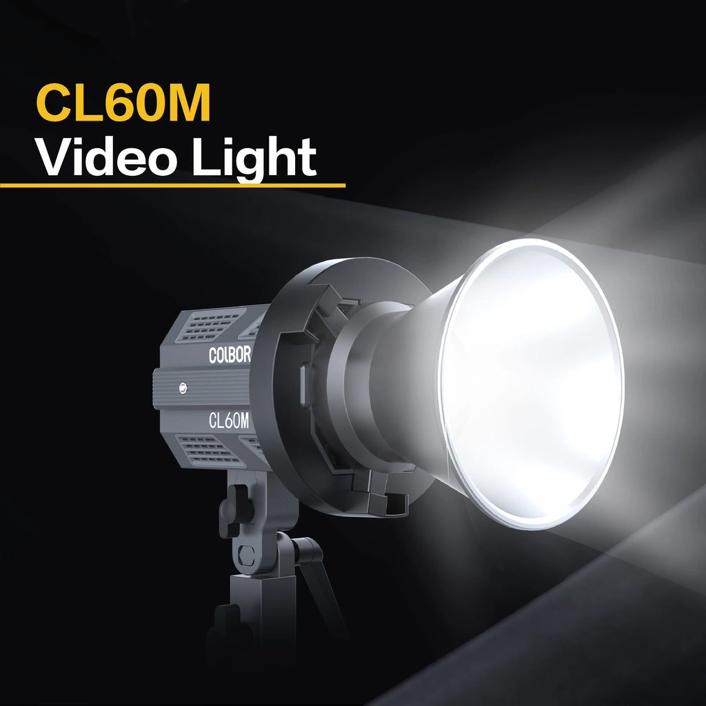 CL60M COB video light with a conical reflector, matte grey metal housing, and adjustable stand mount, emitting bright.