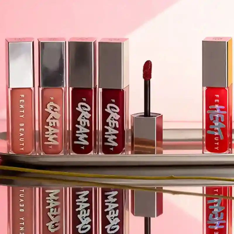 Tidesmit Fenty Beauty transparent glitter lip plumper liquid lipstick texture close-up for hydrating face makeup