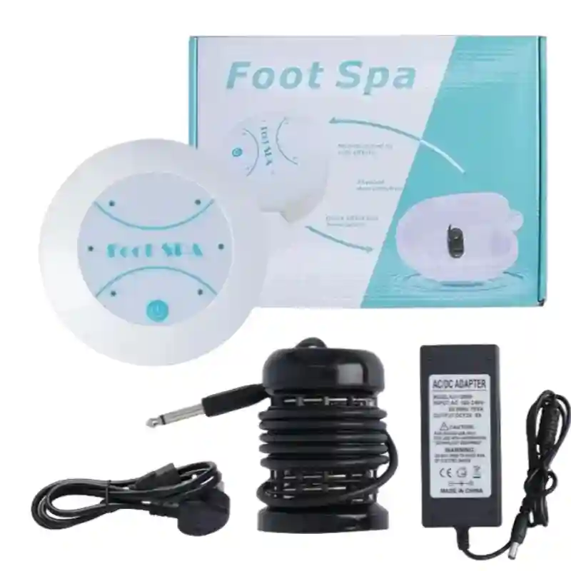 White ionic detox foot spa machine with round control unit, black ion array, power adapter, and retail product box.