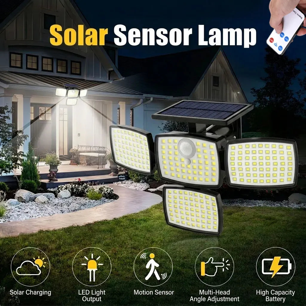Black 4-head outdoor solar flood light with motion sensor illuminating a house exterior.