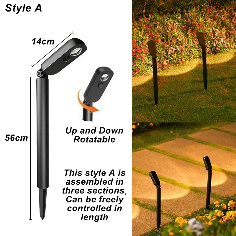 Black LED solar landscape spotlight with rotatable head and stake, shown lighting a garden pathway.