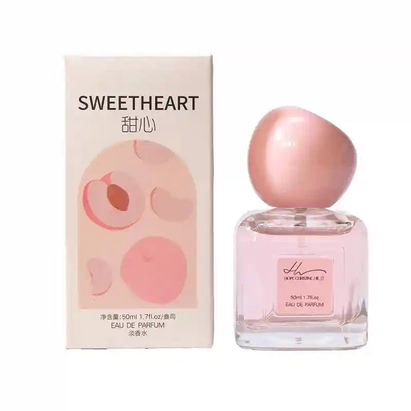 Hope Christine Sweetheart Peach EDP for women. 50ml square perfume bottle, round pink cap, fruity floral fragrance.