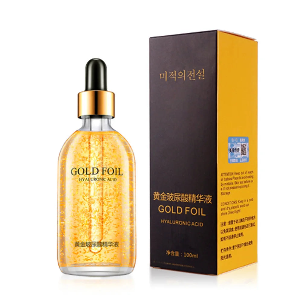 Gold foil hyaluronic acid face serum bottle and matching box, black dropper