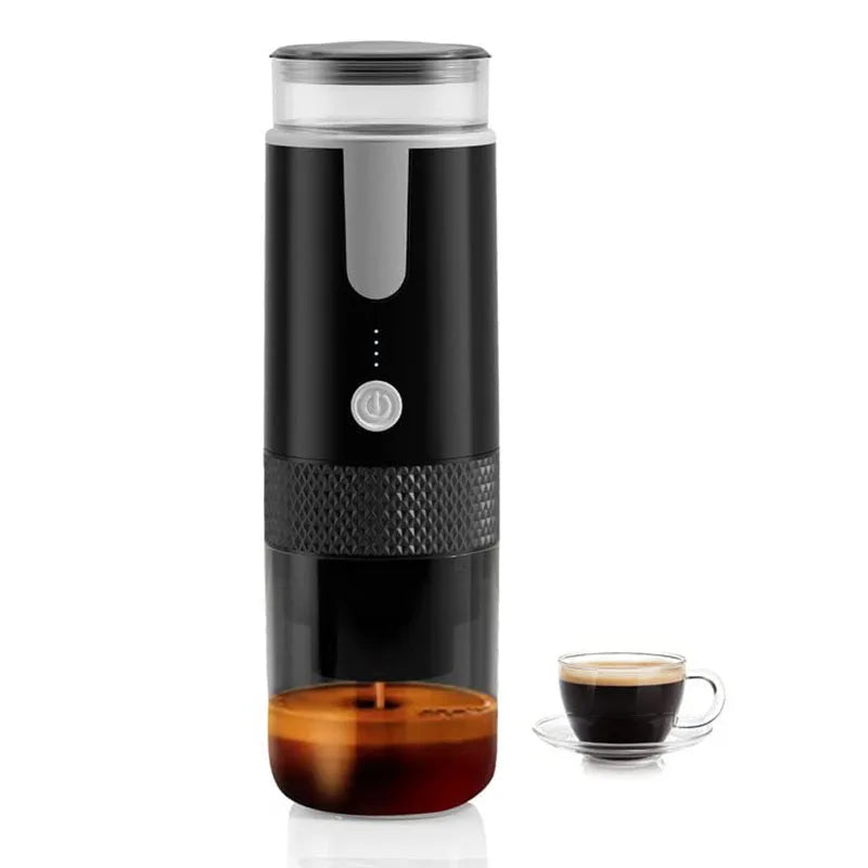 Portable black electric espresso maker with clear glass chamber and one-touch button, brewing fresh coffee in cup.
