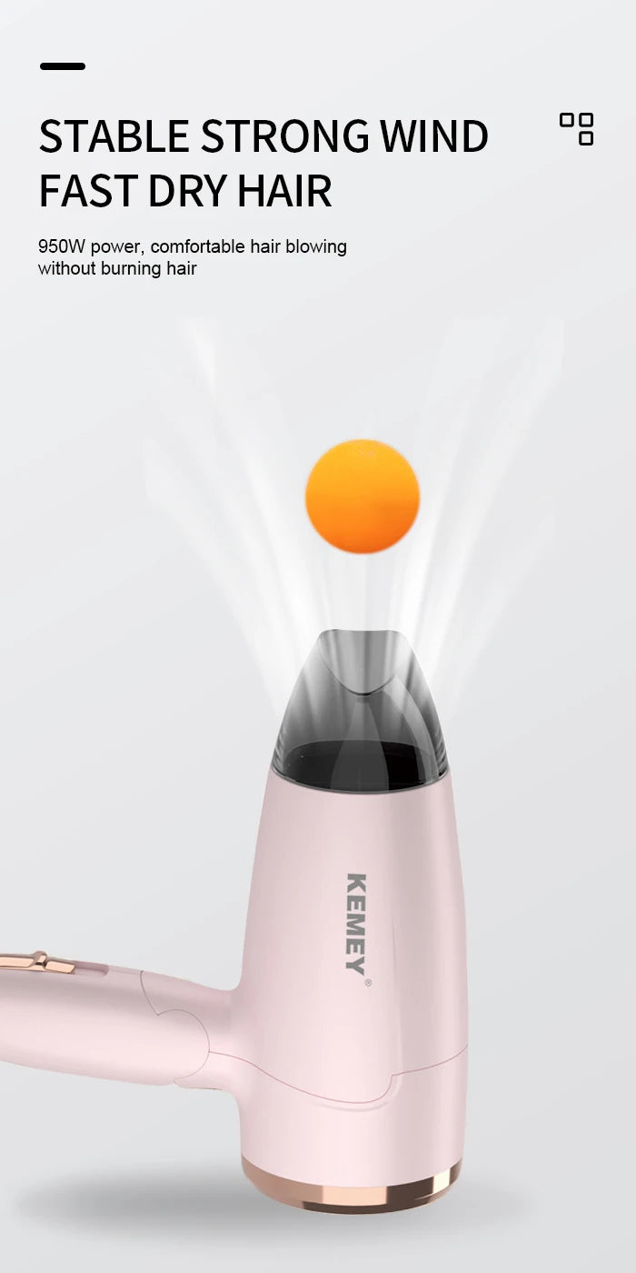 Pink Kemei 950W foldable travel hair dryer with concentrator nozzle for fast, low-noise styling and home use.